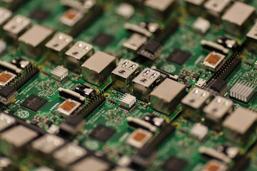 Detailed shot of a Raspberry Pi circuit board showcasing its components, USB ports, and microchips.
